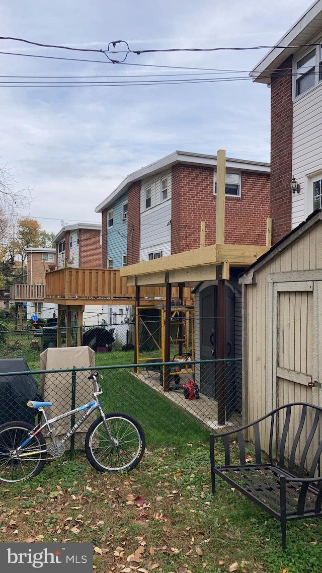 rear view of house with a shed