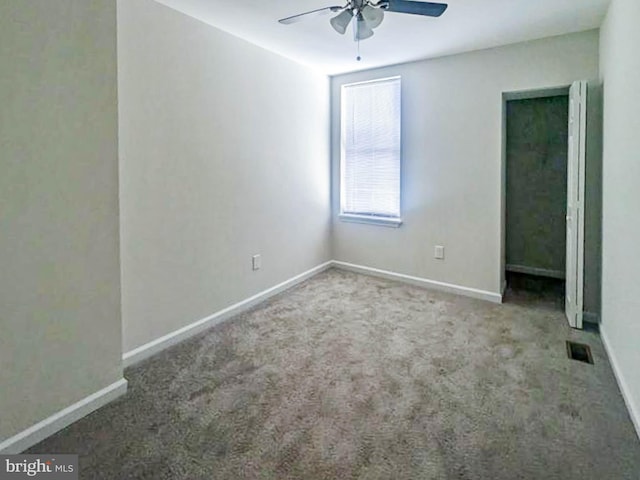 unfurnished bedroom with carpet flooring and ceiling fan