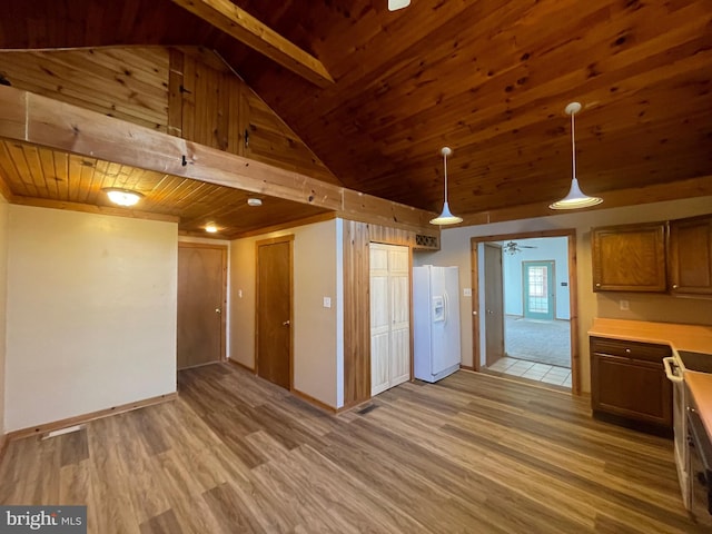 kitchen featuring wood ceiling, high vaulted ceiling, hanging light fixtures, white fridge with ice dispenser, and light hardwood / wood-style floors