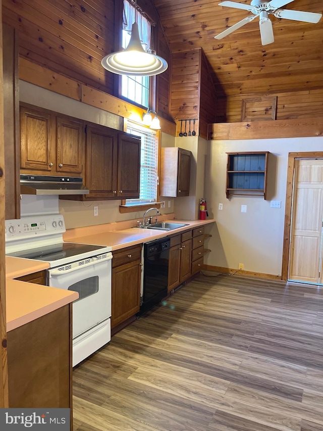 kitchen featuring pendant lighting, sink, white electric range, high vaulted ceiling, and black dishwasher