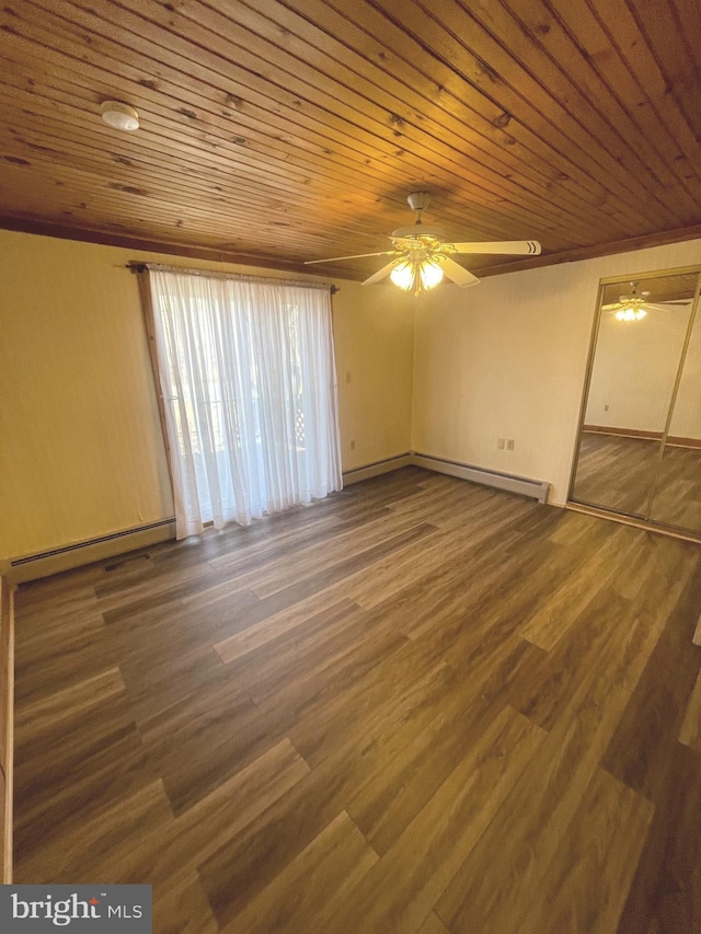 unfurnished room featuring ceiling fan, hardwood / wood-style floors, wooden ceiling, and baseboard heating