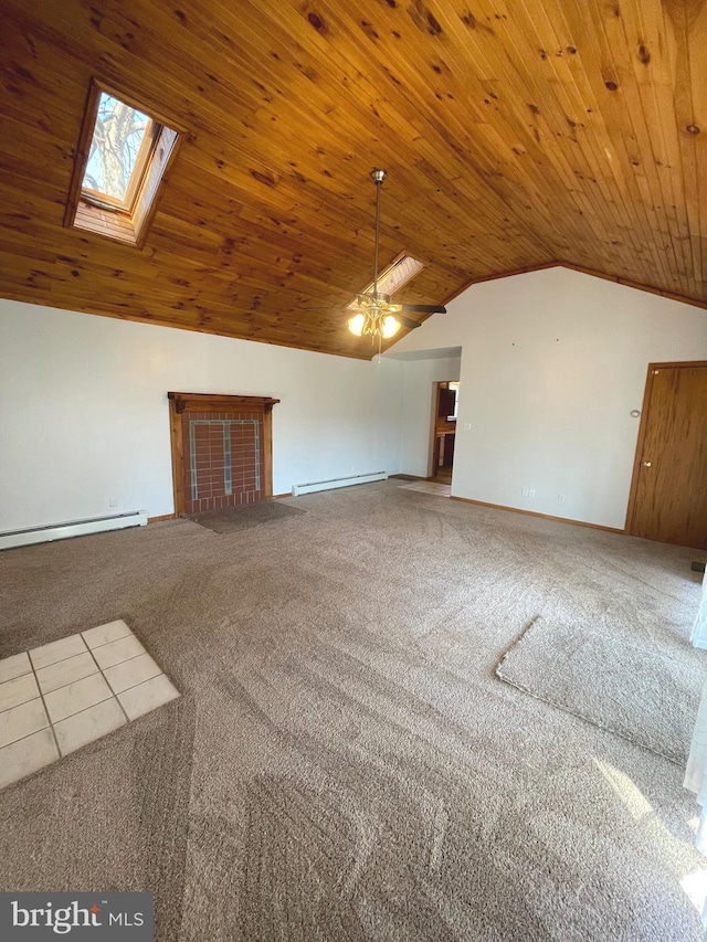 unfurnished living room with carpet, wooden ceiling, vaulted ceiling with skylight, and baseboard heating