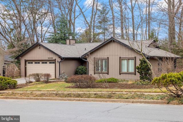 ranch-style home with a garage