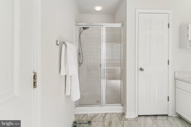 bathroom with electric panel, an enclosed shower, and vanity