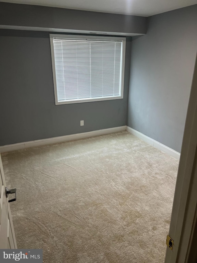 view of carpeted spare room