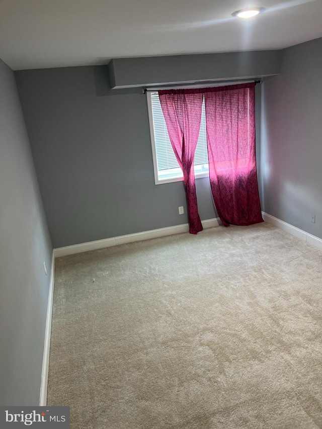 empty room with carpet floors