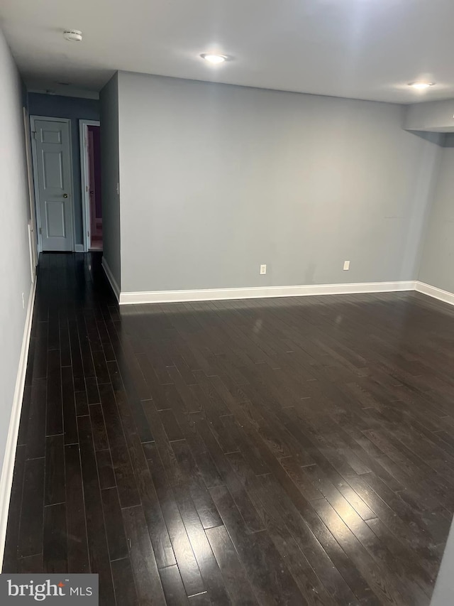 empty room featuring dark hardwood / wood-style floors