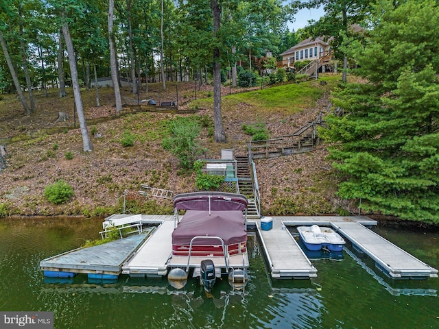 view of dock with a water view