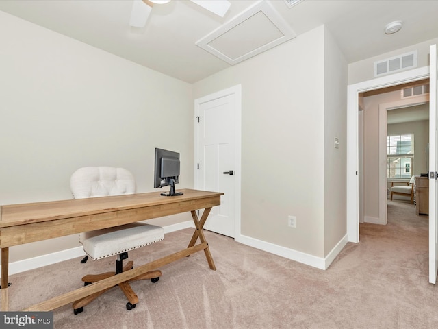 office area with light colored carpet and ceiling fan