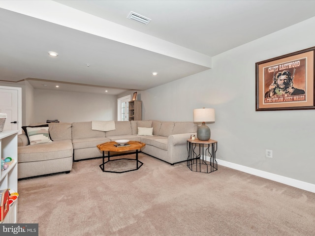 living room featuring light carpet