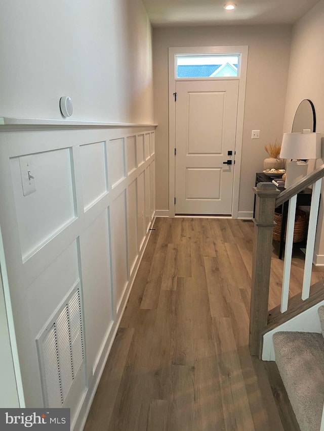 doorway featuring wood-type flooring