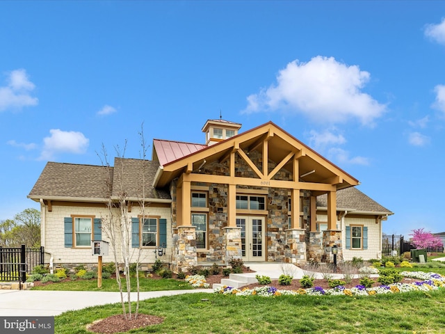 view of front of property with a front lawn and covered porch