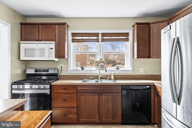 kitchen featuring stainless steel appliances and sink