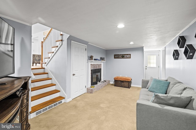 carpeted living room featuring crown molding and a fireplace