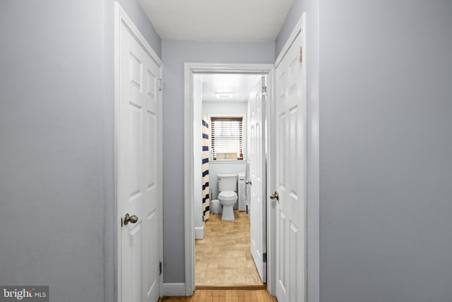 hallway featuring light wood-type flooring