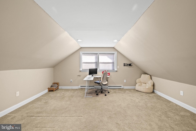 unfurnished office with a baseboard radiator, vaulted ceiling, and light carpet