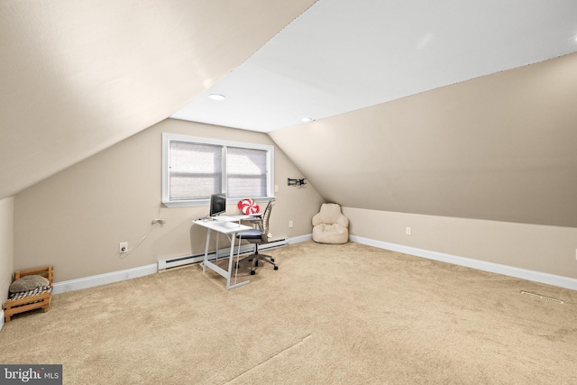 unfurnished office with vaulted ceiling, a baseboard heating unit, and light carpet