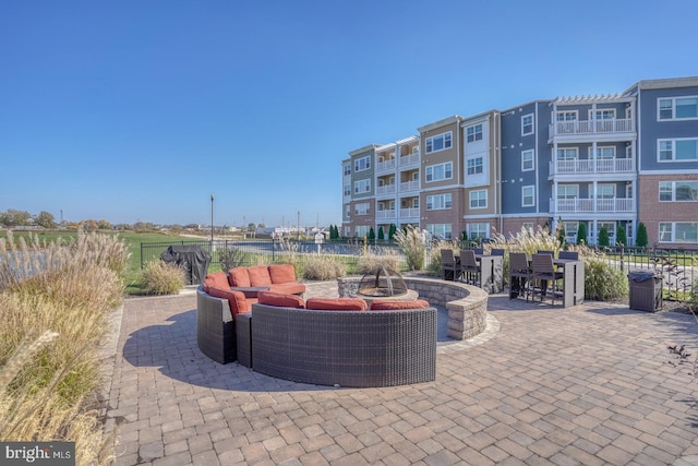 view of patio with an outdoor fire pit