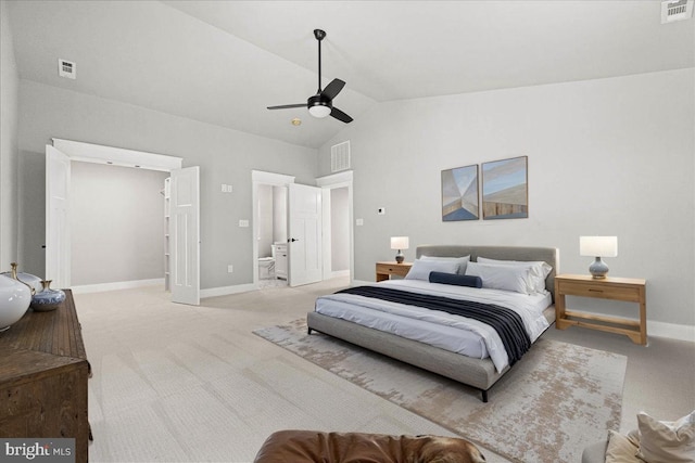 carpeted bedroom featuring ceiling fan, connected bathroom, and high vaulted ceiling