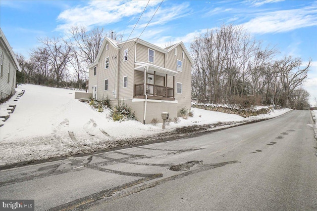 view of snow covered property