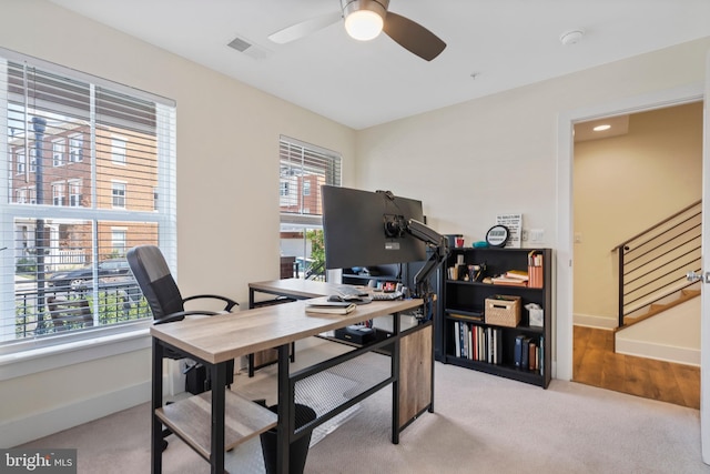 office space featuring ceiling fan