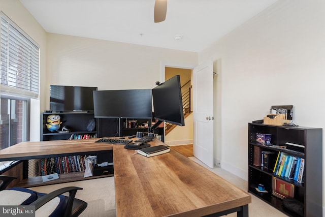 office area with ceiling fan