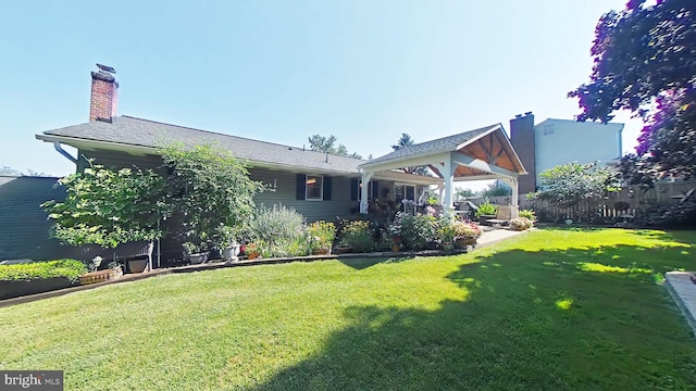 view of yard featuring a gazebo and a patio area