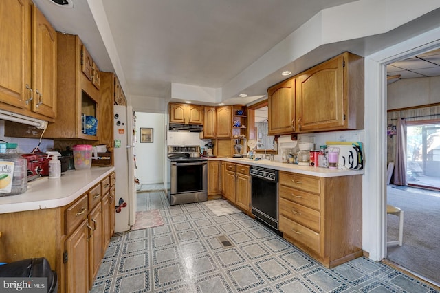 kitchen featuring dishwasher, sink, stainless steel range with electric cooktop, decorative backsplash, and white fridge