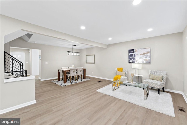 sitting room with light hardwood / wood-style floors