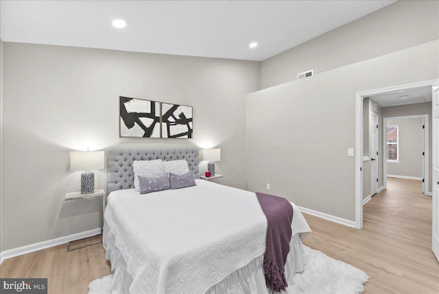 bedroom with light wood-type flooring