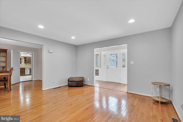 entryway with light hardwood / wood-style flooring