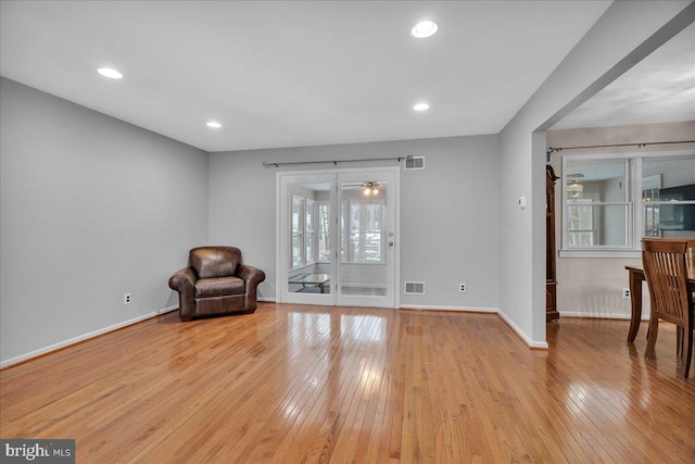 sitting room with light hardwood / wood-style floors