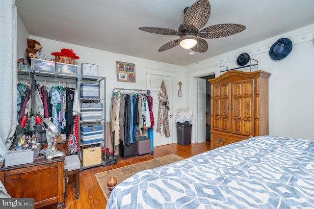 bedroom featuring ceiling fan and light hardwood / wood-style flooring