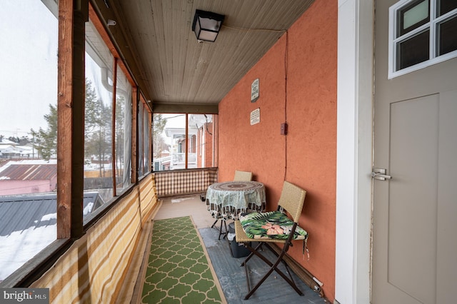 sunroom / solarium with wooden ceiling