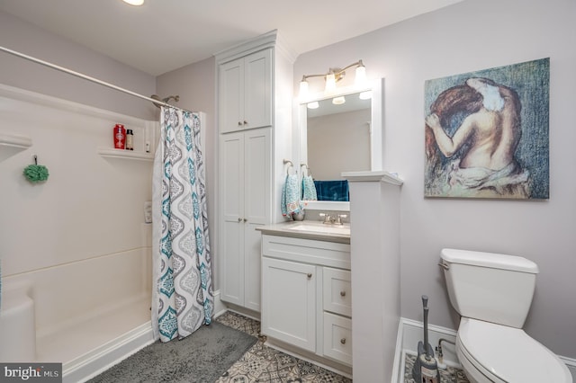 bathroom with vanity, toilet, and a shower with shower curtain