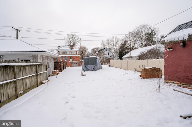 view of snowy yard