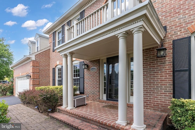 entrance to property featuring a garage