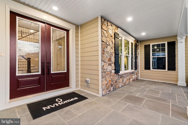 doorway to property featuring french doors