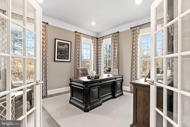 office area with ornamental molding and french doors