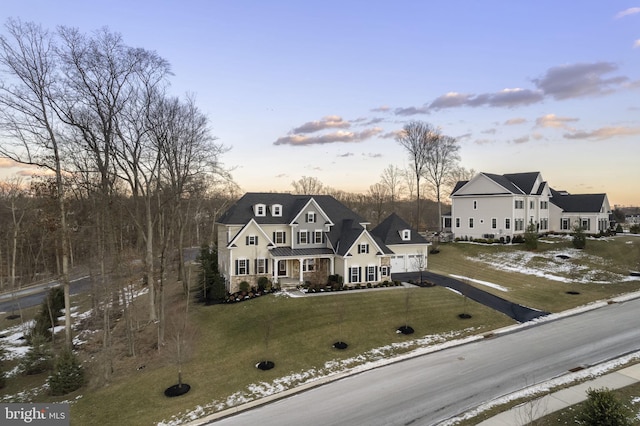 view of front of house with a lawn