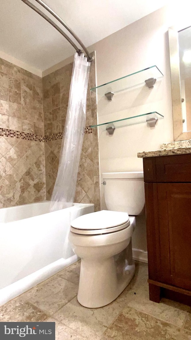 full bathroom featuring vanity, toilet, and shower / bath combo with shower curtain