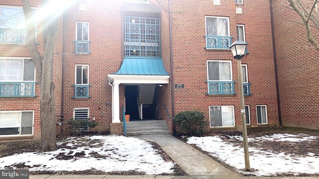 view of snow covered building