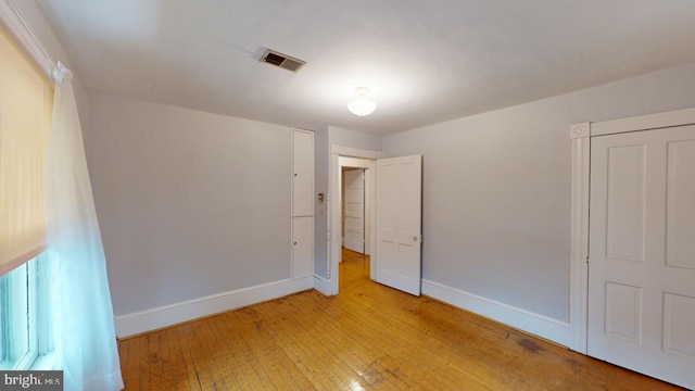 unfurnished bedroom featuring light hardwood / wood-style floors