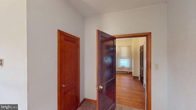 hall featuring hardwood / wood-style flooring