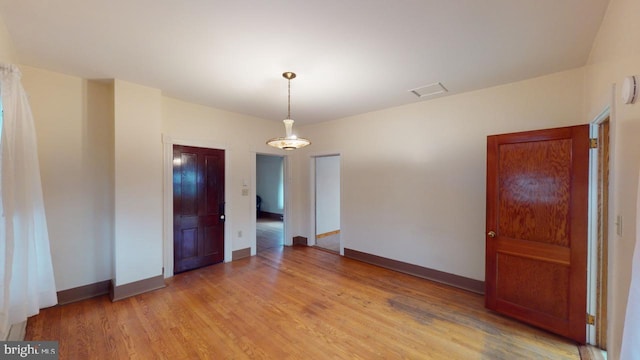 empty room featuring light wood-type flooring