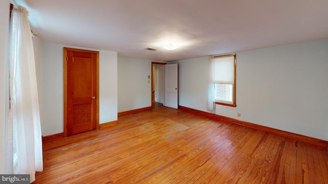 unfurnished bedroom featuring light hardwood / wood-style flooring