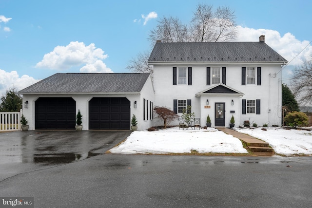 view of front of home with a garage