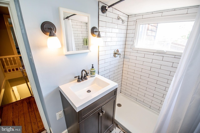 bathroom with vanity and a shower with shower curtain