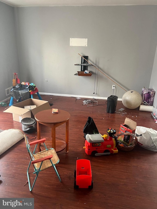 living room featuring dark wood-type flooring