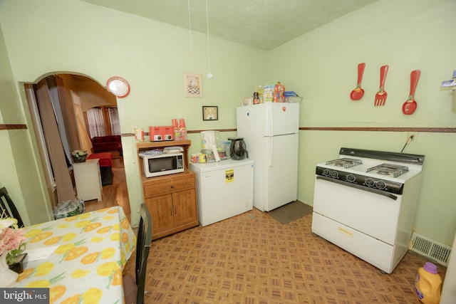 kitchen with white appliances